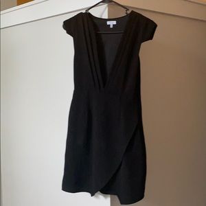 Toby black envelope dress with deep V cut